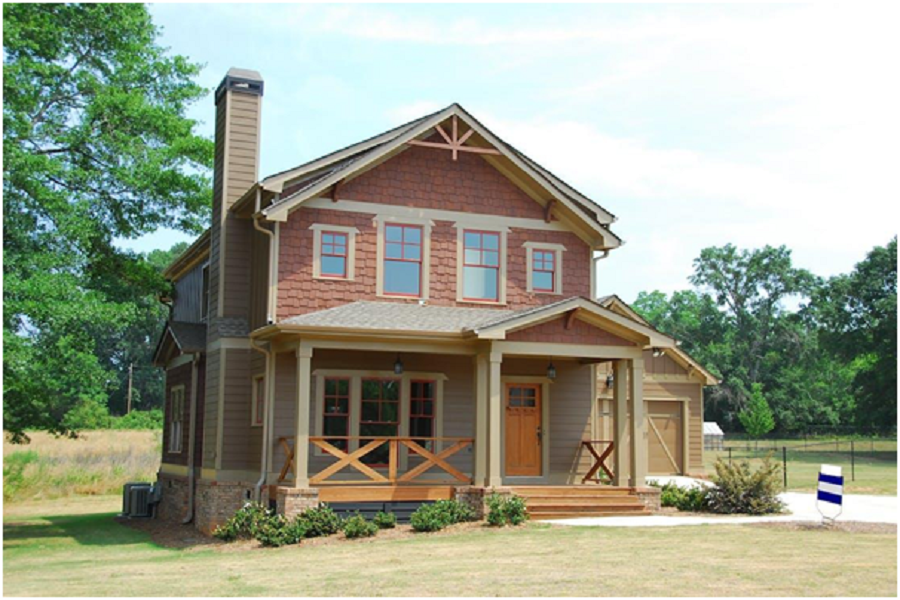 a home’s exterior with a chimney. 