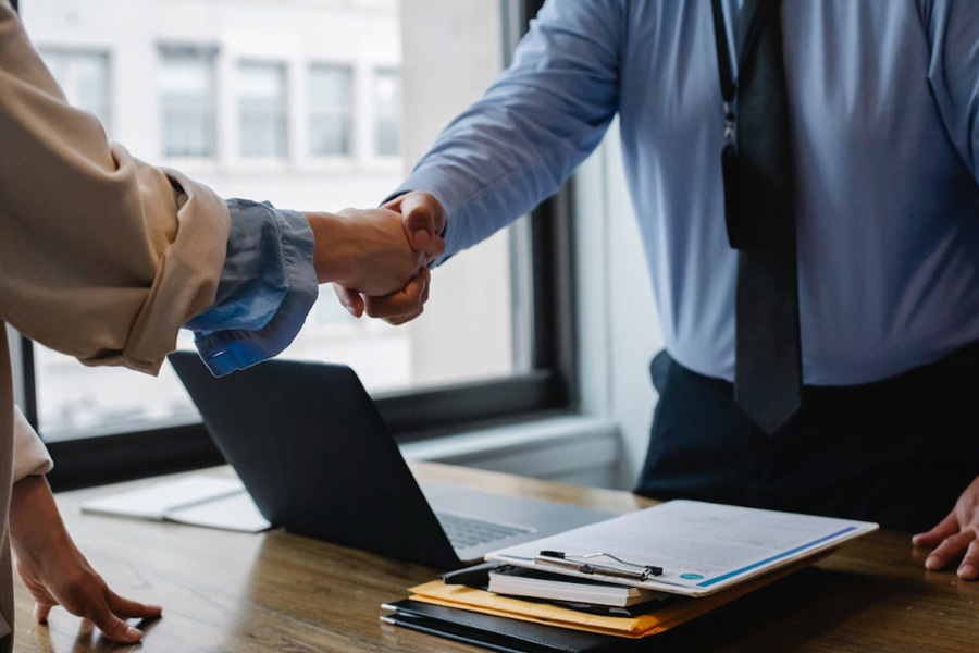 Realtor Shaking Hands Witha Client